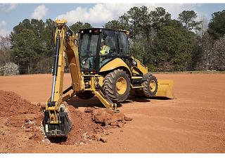 Екскаватор-навантажувач Caterpillar 430F
