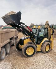 Екскаватор-навантажувач Caterpillar 444E 4x4