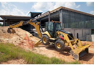 Екскаватор-навантажувач Caterpillar 450F