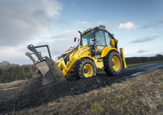 Екскаватор-навантажувач New Holland B100C TC