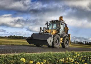 Екскаватор-навантажувач New Holland B115C