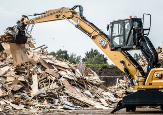 Екскаватори для перевалки Caterpillar MH3026