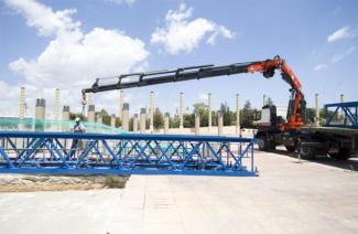 Гідравлічні вантажні крани Fassi F 385 RA 2.24 e-dynamic