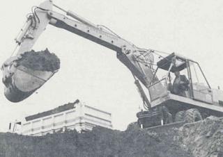 Гусеничні екскаватори Caterpillar 214