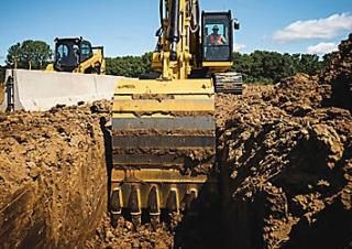 Гусеничні екскаватори Caterpillar 320