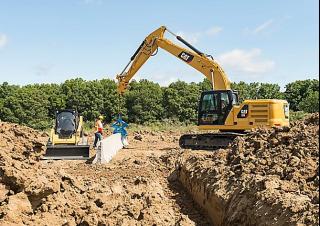 Гусеничні екскаватори Caterpillar 320