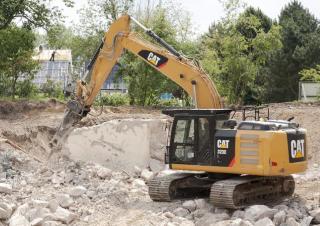 Гусеничні екскаватори Caterpillar 323E L