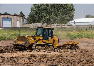 Гусеничні навантажувачі Caterpillar 953K