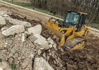 Гусеничні навантажувачі Caterpillar 973K