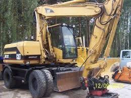 Колісні екскаватори Caterpillar M 315 Mono
