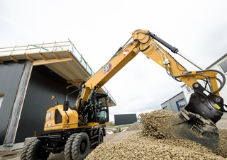 Колісні екскаватори Caterpillar M317