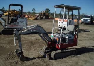 Міні-екскаватори Takeuchi TB 007