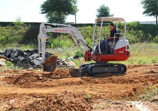 Міні-екскаватори Takeuchi TB 230