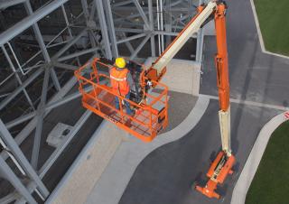 Телескопічні підйомники Колісні телескопічні підйомники JLG 1500SJ