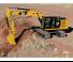 Гусеничні екскаватори Caterpillar 323F SA