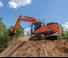 Гусеничні екскаватори Doosan DX235LC-7