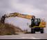 Колісні екскаватори Caterpillar M319