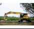 Колісні екскаватори Caterpillar M323F 