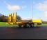 Транспортні технології Низькорамний причіп Rolland Low loader 90