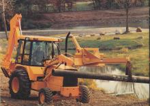 Екскаватор-навантажувач John Deere Construction 210 C