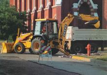 Екскаватор-навантажувач John Deere Construction 410 E