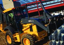 Екскаватор-навантажувач John Deere Construction 410 J TMC
