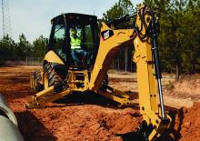 Екскаватор-навантажувач Caterpillar 420 E