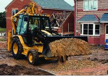 Екскаватор-навантажувач Caterpillar 438 D 4x4