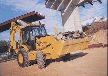 Екскаватор-навантажувач Caterpillar 446 D