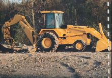 Екскаватор-навантажувач John Deere Construction 610 C