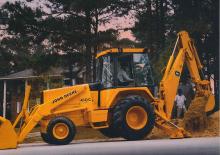 Екскаватор-навантажувач John Deere Construction 710 B