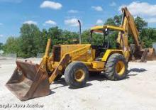 Екскаватор-навантажувач John Deere Construction 710 C