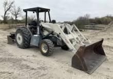 Екскаватор-навантажувач Terex TX640