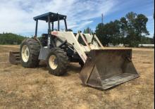Екскаватор-навантажувач Terex TX650