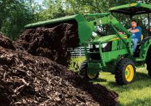 Фронтальний навантажувач John Deere 400E