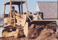 Гусеничні навантажувачі Caterpillar 935C