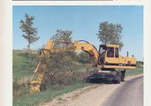 Колісні екскаватори Caterpillar 214B FT