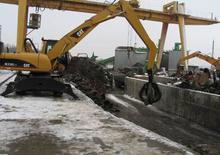 Колісні екскаватори Caterpillar M 318 C MH