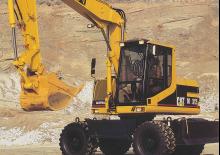 Колісні екскаватори Caterpillar M312