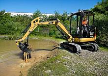 Міні-екскаватори Caterpillar 302.4D