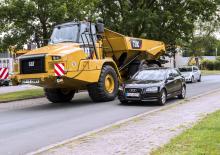 Шарнірні самоскиди Caterpillar 730