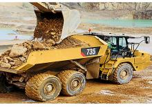 Шарнірні самоскиди Caterpillar 735