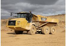 Шарнірні самоскиди Caterpillar 735