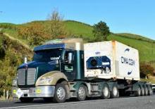 Тягачі Kenworth T410 860mm Aero roof MX13 8x4