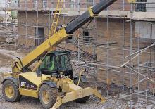 Телескопічні навантажувачі Caterpillar TH 83