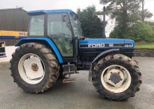 Трактори з заднім приводом Ford-NH 8240